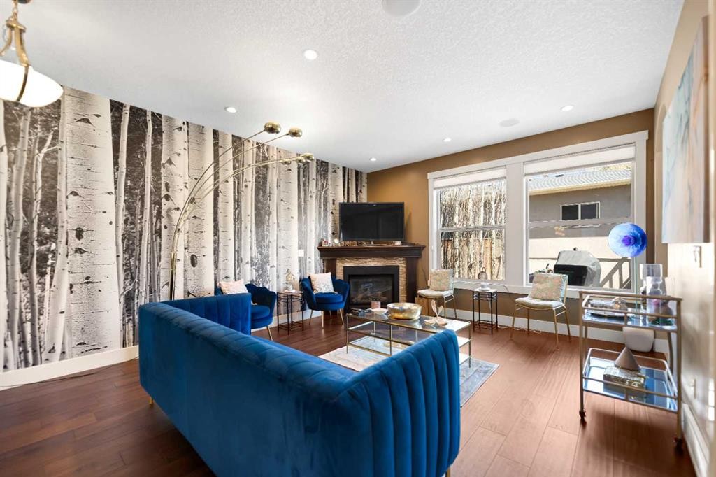 4410 17 Avenue Nw, Calgary, AB - Indoor Photo Showing Living Room With Fireplace
