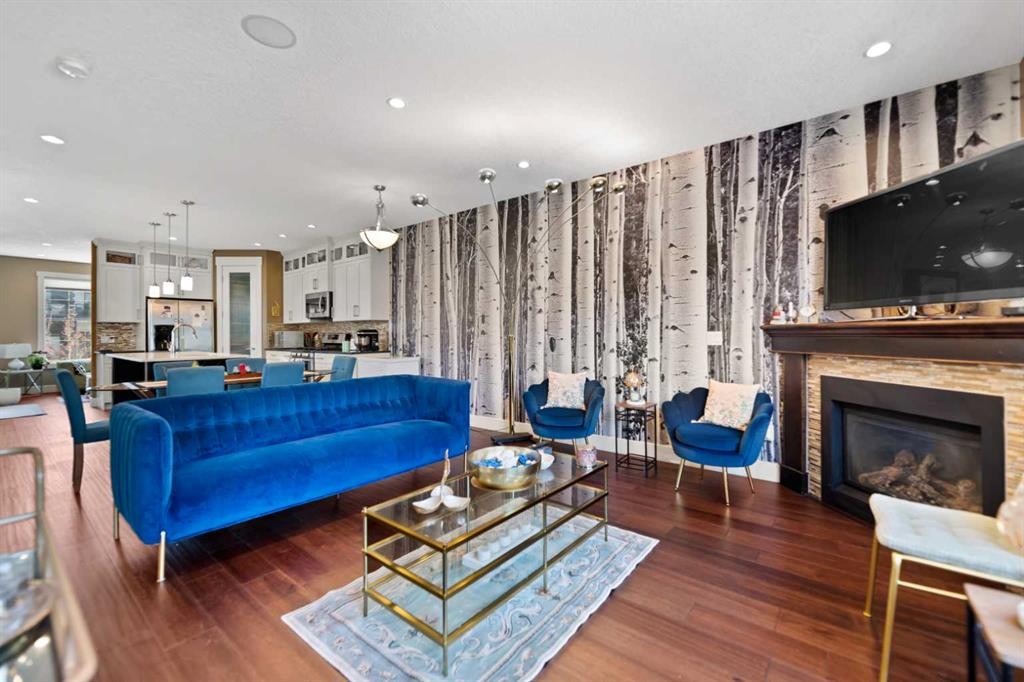 4410 17 Avenue Nw, Calgary, AB - Indoor Photo Showing Living Room With Fireplace