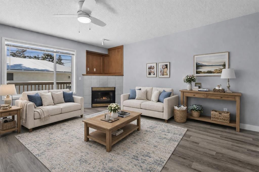 3103 39 Street Sw, Calgary, AB - Indoor Photo Showing Living Room With Fireplace