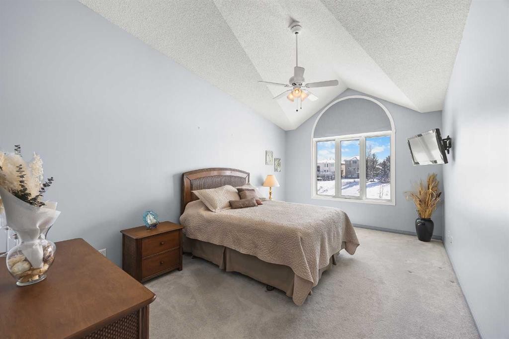 8 Edgevalley View Nw, Calgary, AB - Indoor Photo Showing Bedroom