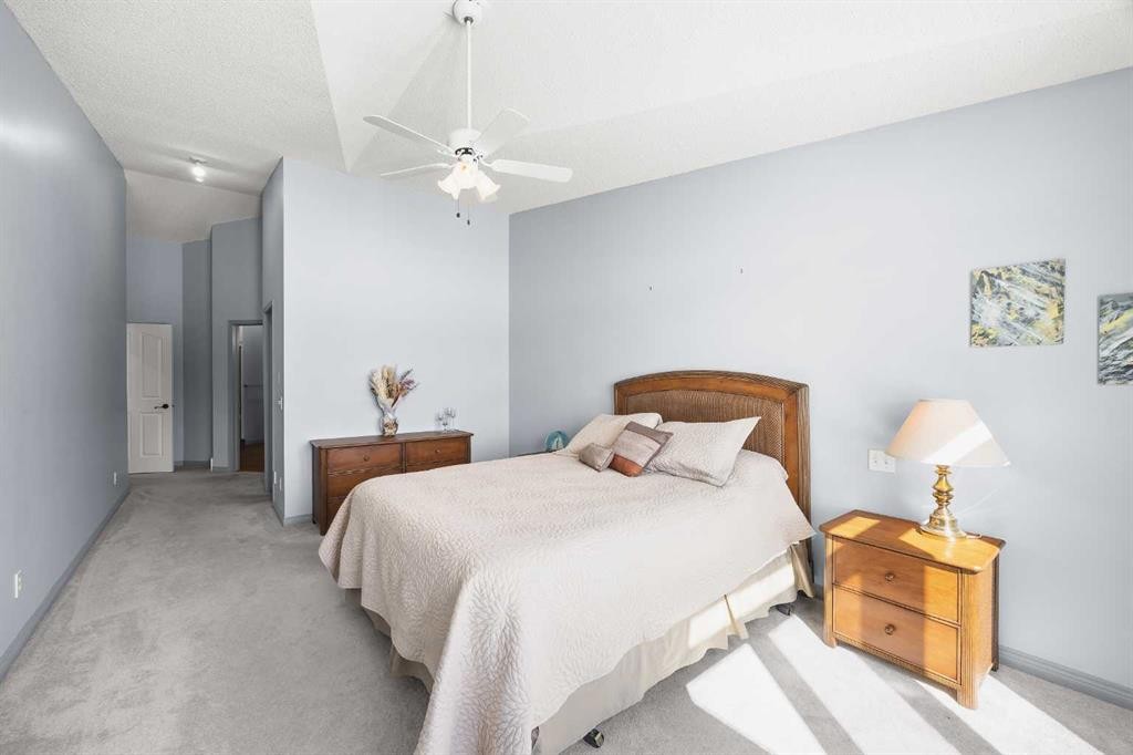 8 Edgevalley View Nw, Calgary, AB - Indoor Photo Showing Bedroom
