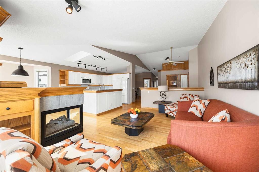 8 Edgevalley View Nw, Calgary, AB - Indoor Photo Showing Living Room With Fireplace