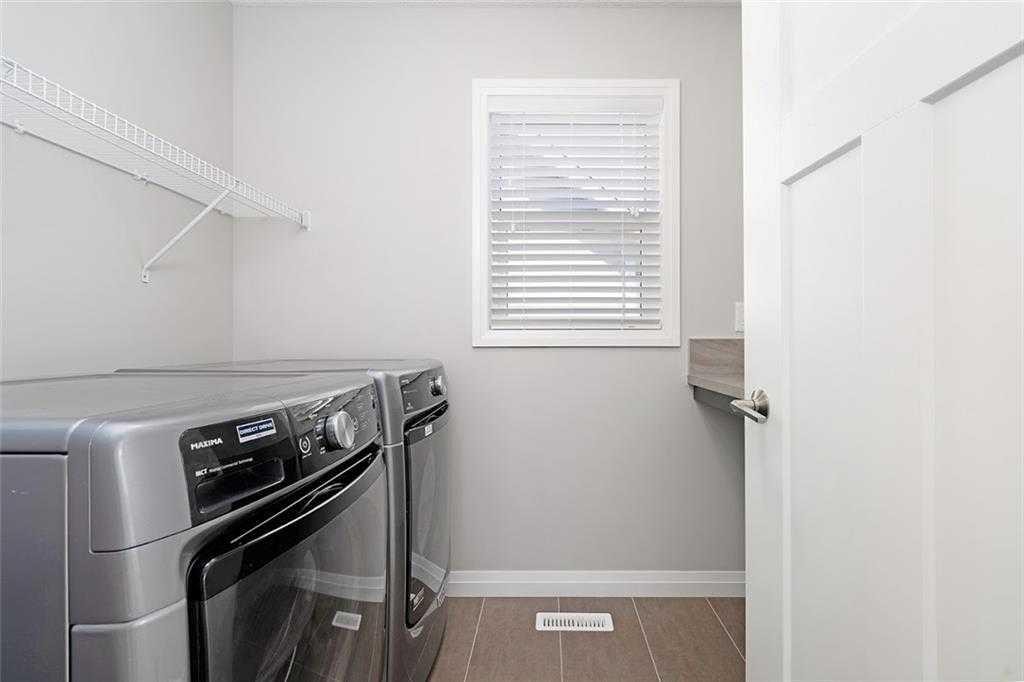 124 Auburn Meadows Crescent Se, Calgary, AB - Indoor Photo Showing Laundry Room