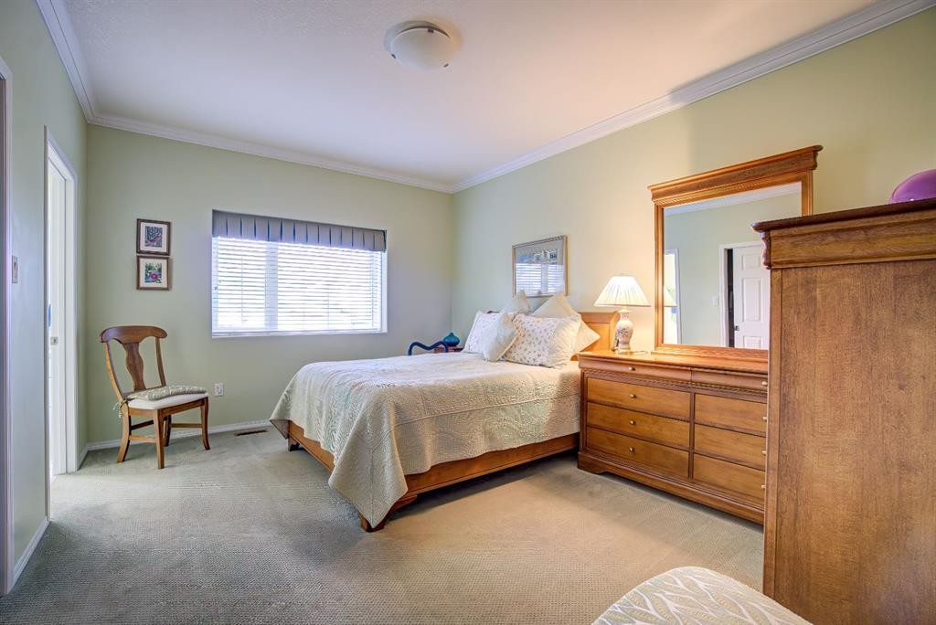 8 Link Spur, Claresholm, AB - Indoor Photo Showing Bedroom
