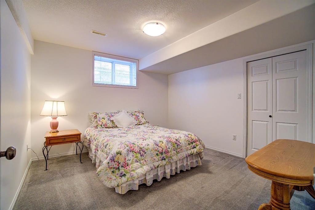 8 Link Spur, Claresholm, AB - Indoor Photo Showing Bedroom