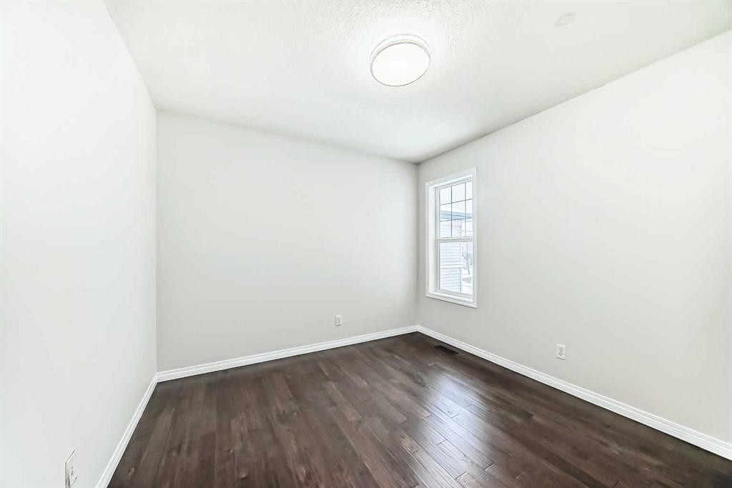 21 Panamount Row Nw, Calgary, AB - Indoor Photo Showing Other Room