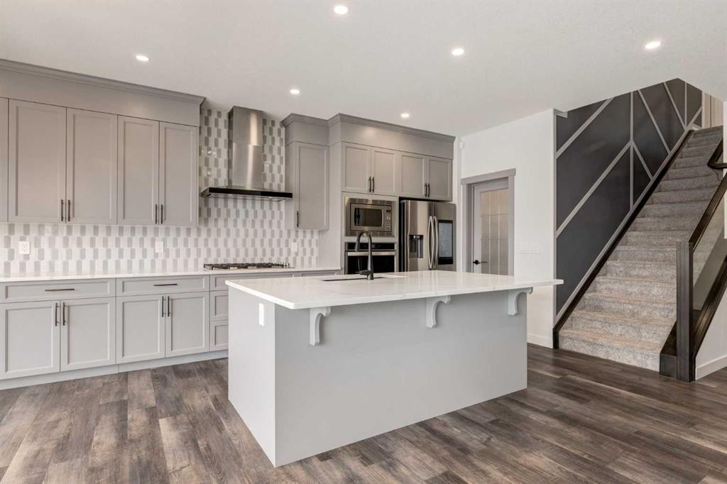 142 Cranbrook Park Se, Calgary, AB - Indoor Photo Showing Kitchen With Upgraded Kitchen