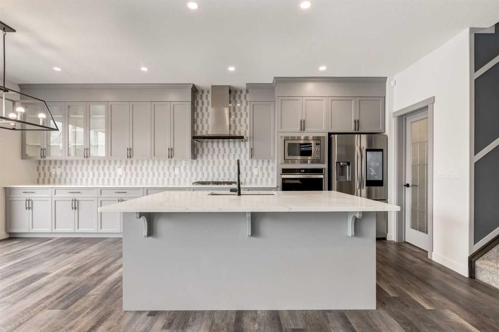 142 Cranbrook Park Se, Calgary, AB - Indoor Photo Showing Kitchen With Upgraded Kitchen