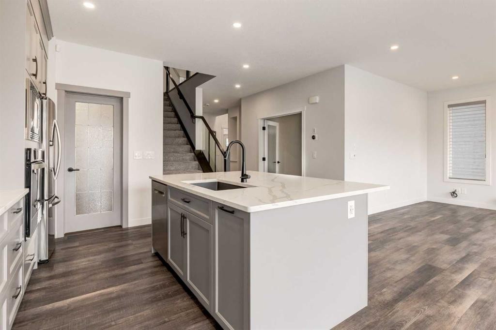 142 Cranbrook Park Se, Calgary, AB - Indoor Photo Showing Kitchen With Upgraded Kitchen