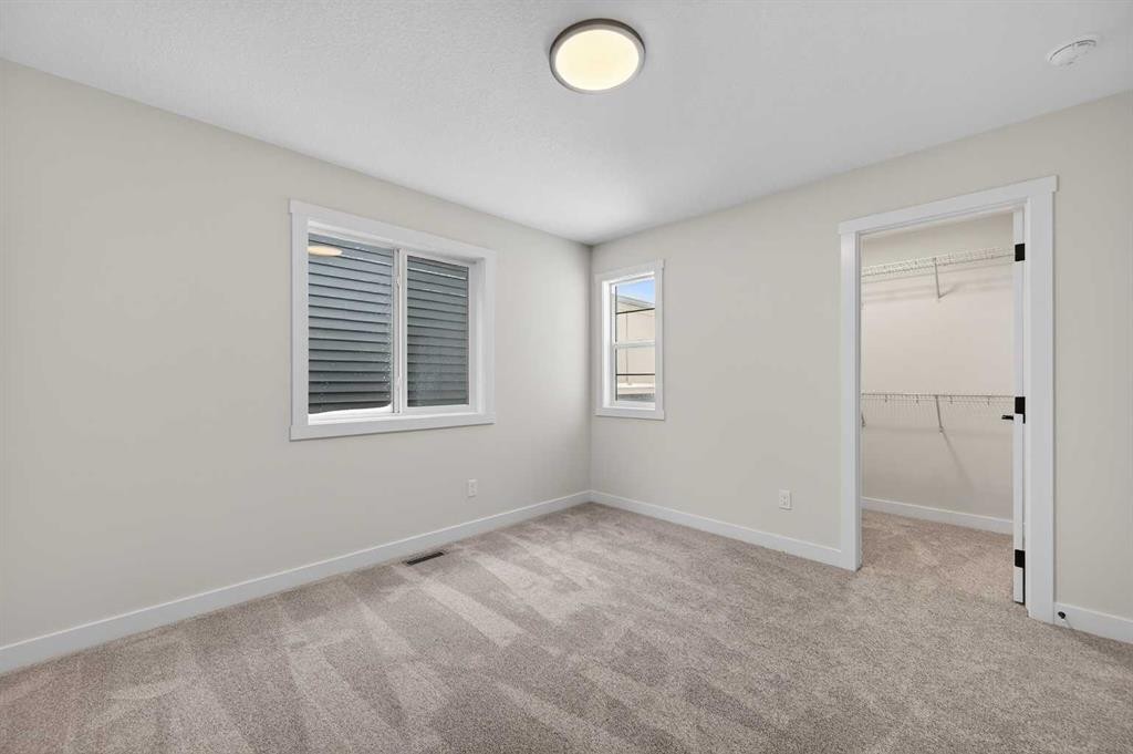 36 Lewiston Common Ne, Calgary, AB - Indoor Photo Showing Other Room