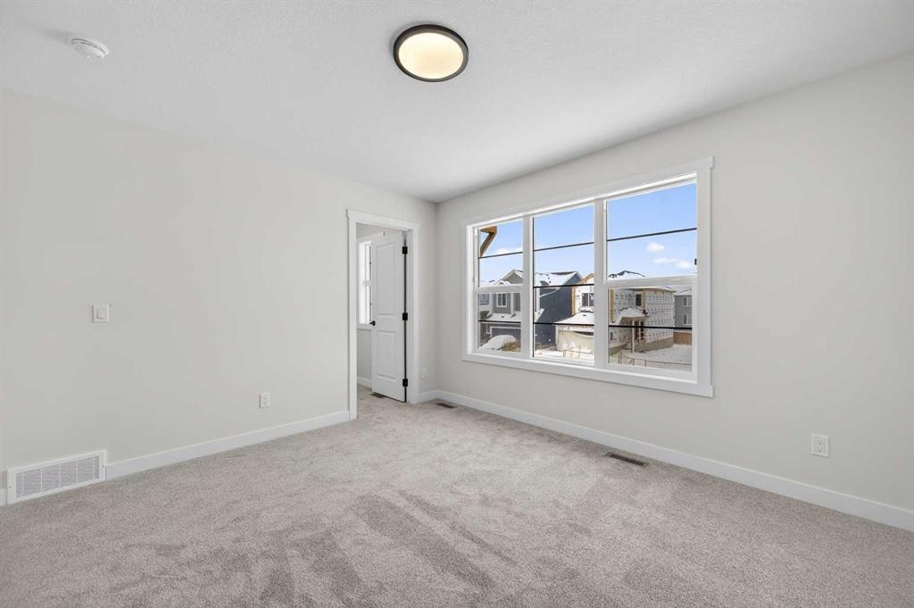 36 Lewiston Common Ne, Calgary, AB - Indoor Photo Showing Other Room
