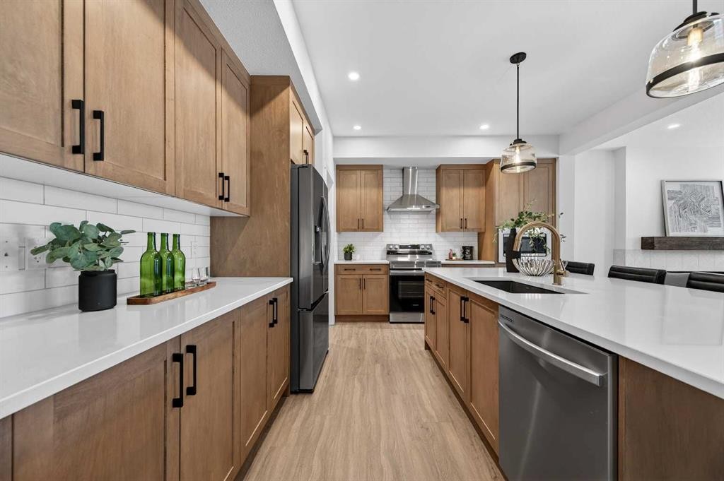 36 Lewiston Common Ne, Calgary, AB - Indoor Photo Showing Kitchen With Stainless Steel Kitchen With Upgraded Kitchen
