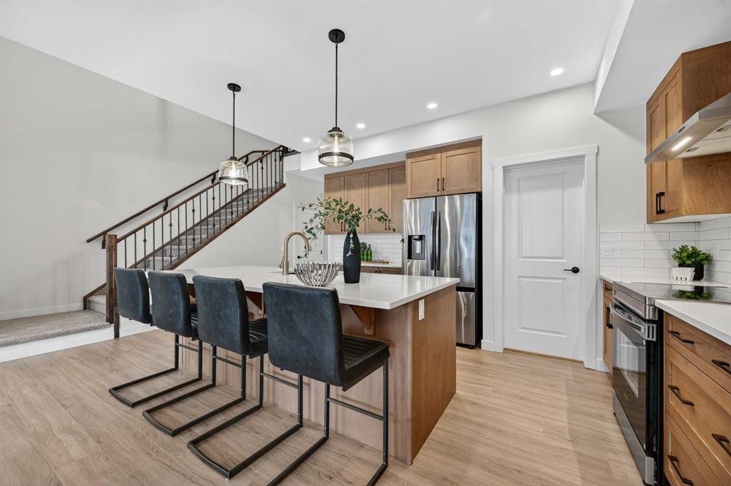 36 Lewiston Common Ne, Calgary, AB - Indoor Photo Showing Kitchen With Stainless Steel Kitchen With Upgraded Kitchen