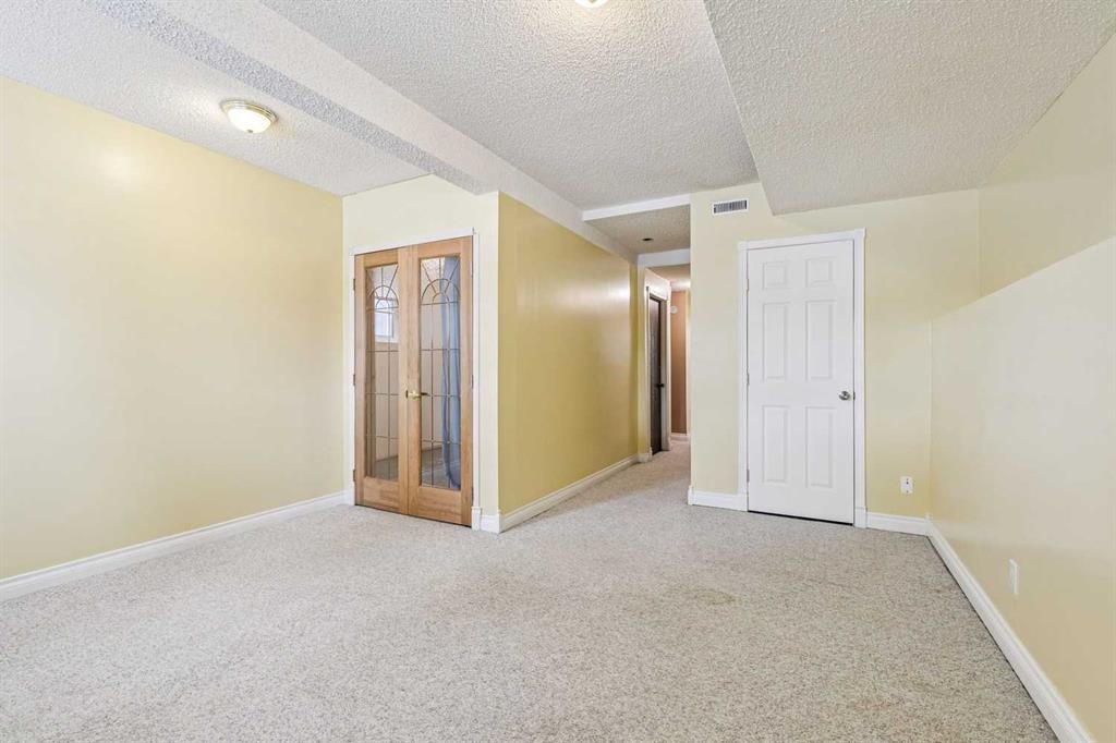 131 Woodglen Way Sw, Calgary, AB - Indoor Photo Showing Other Room