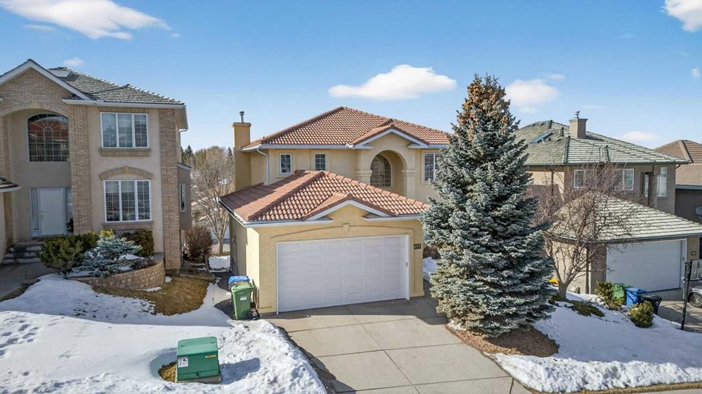 255 Hamptons Terrace Nw, Calgary, AB - Outdoor With Facade