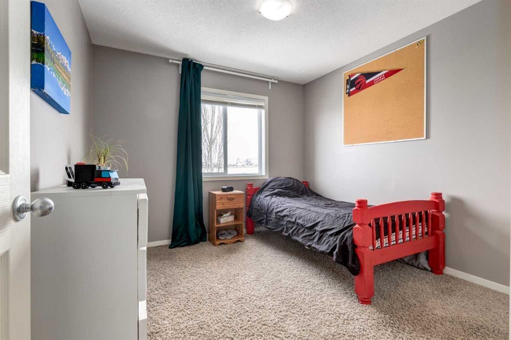 138 Cranberry Place Se, Calgary, AB - Indoor Photo Showing Bedroom
