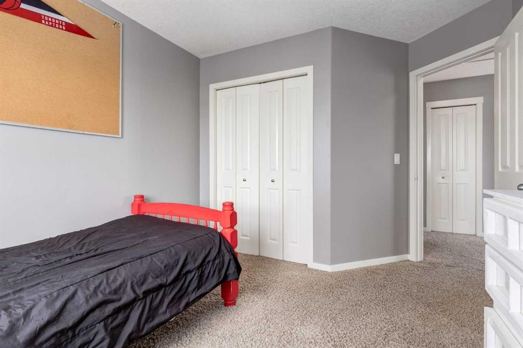 138 Cranberry Place Se, Calgary, AB - Indoor Photo Showing Bedroom