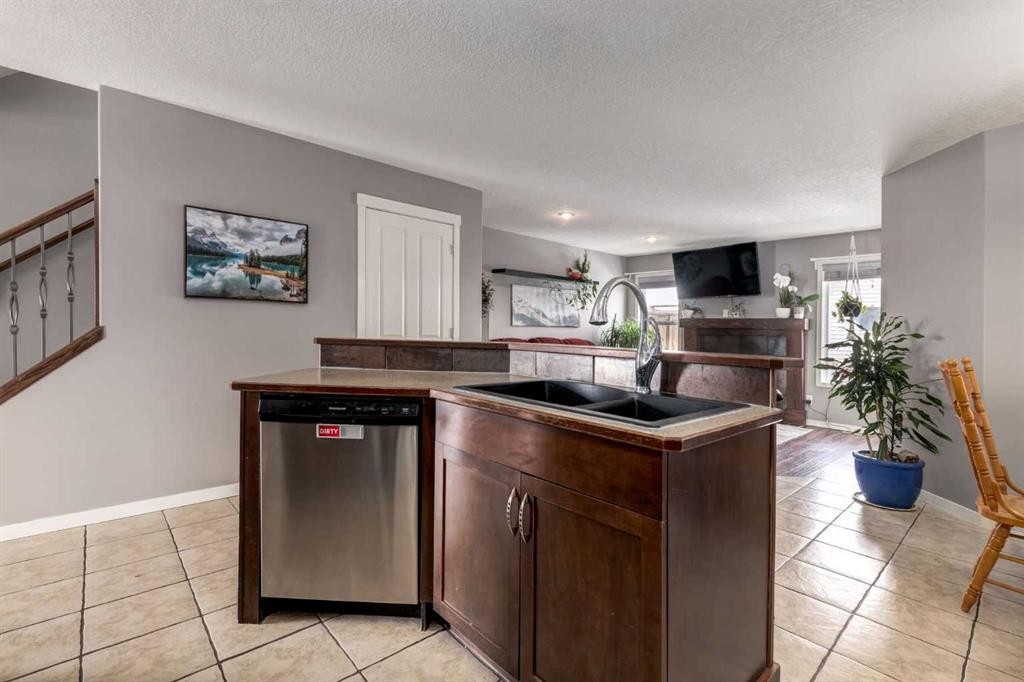 138 Cranberry Place Se, Calgary, AB - Indoor Photo Showing Kitchen With Double Sink