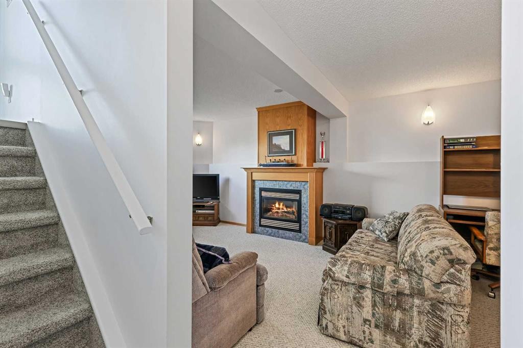 272 Saddlemead Road Ne, Calgary, AB - Indoor With Fireplace