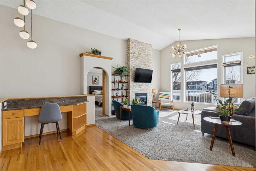 113 Westchester Way, Chestermere, AB - Indoor Photo Showing Living Room With Fireplace
