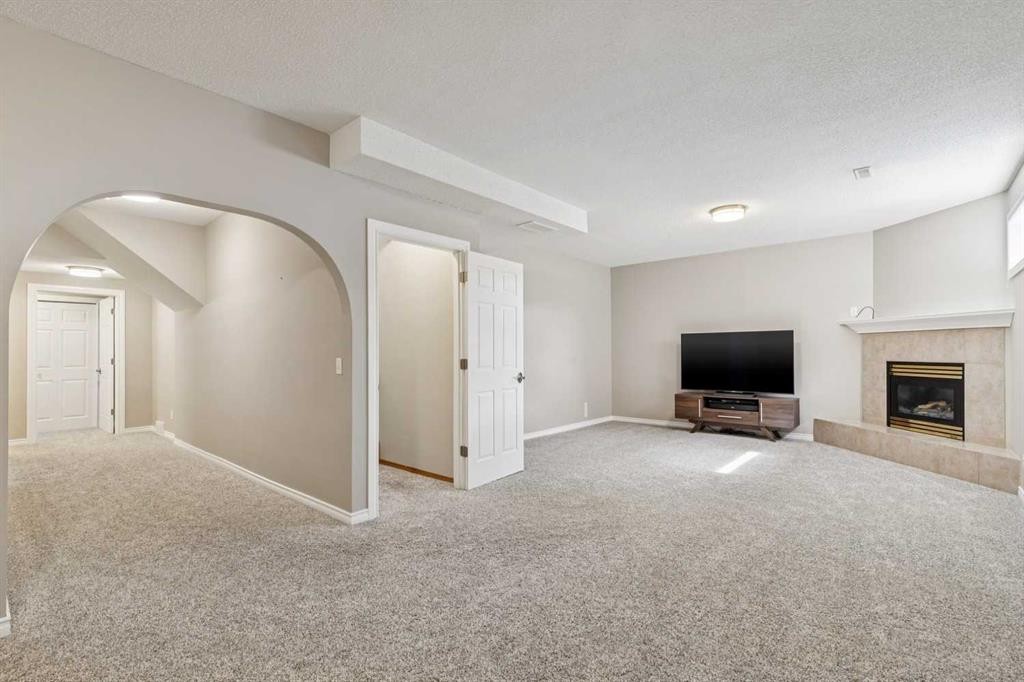 113 Westchester Way, Chestermere, AB - Indoor With Fireplace