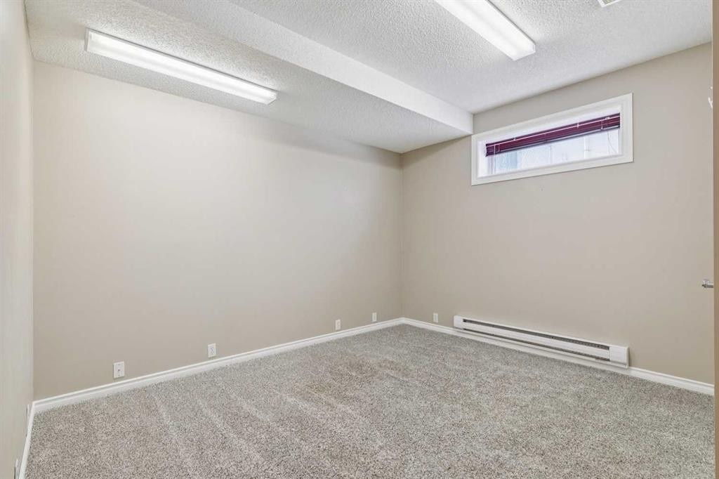 113 Westchester Way, Chestermere, AB - Indoor Photo Showing Other Room
