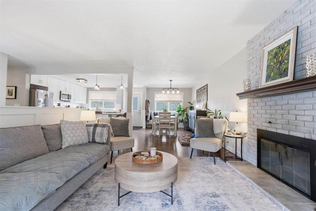 8411 Silver Springs Road Nw, Calgary, AB - Indoor Photo Showing Living Room With Fireplace