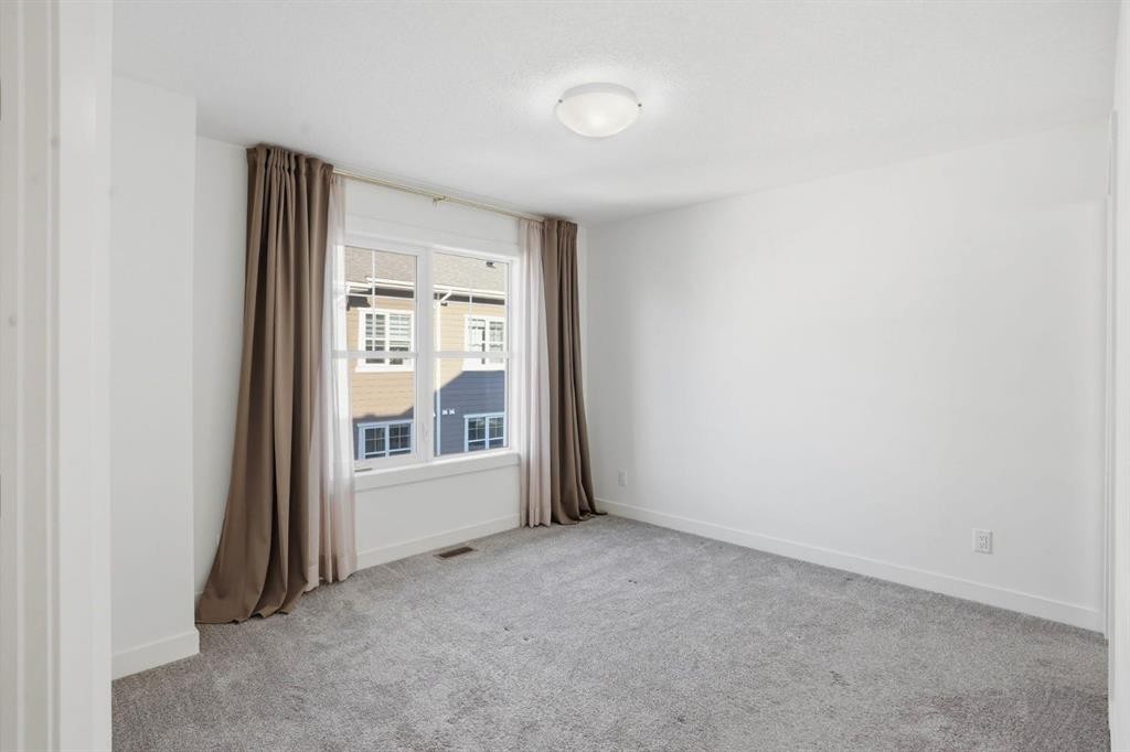 812 Cranbrook Walk Se, Calgary, AB - Indoor Photo Showing Other Room