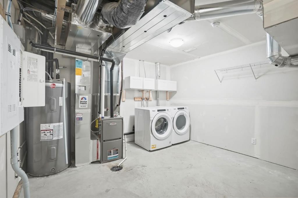 812 Cranbrook Walk Se, Calgary, AB - Indoor Photo Showing Laundry Room