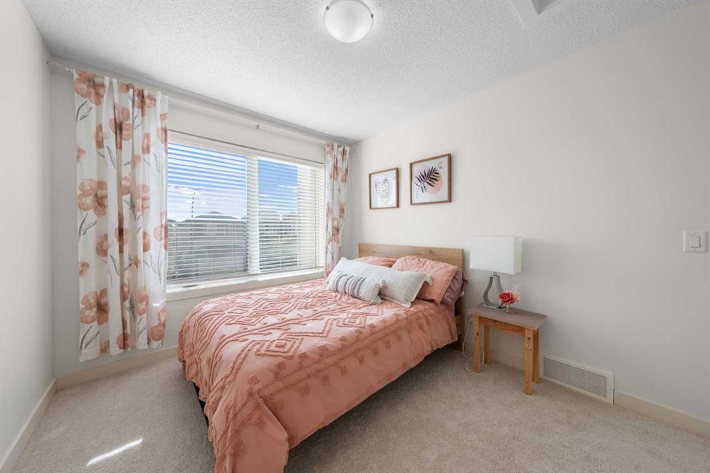 237 Walden Parade Se, Calgary, AB - Indoor Photo Showing Bedroom