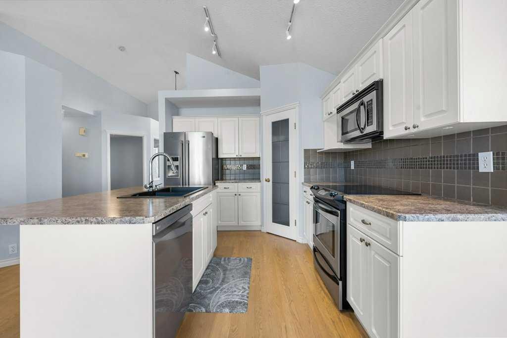 58 Chaparral Close Se, Calgary, AB - Indoor Photo Showing Kitchen With Upgraded Kitchen