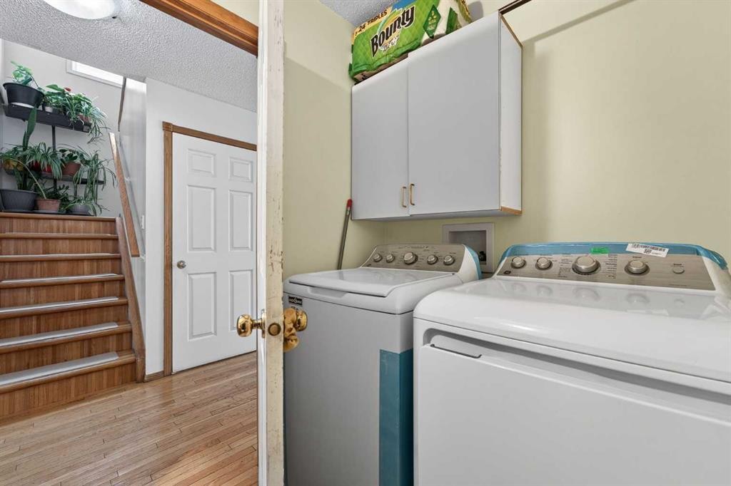 14 Hidden Ranch Hill Nw, Calgary, AB - Indoor Photo Showing Laundry Room