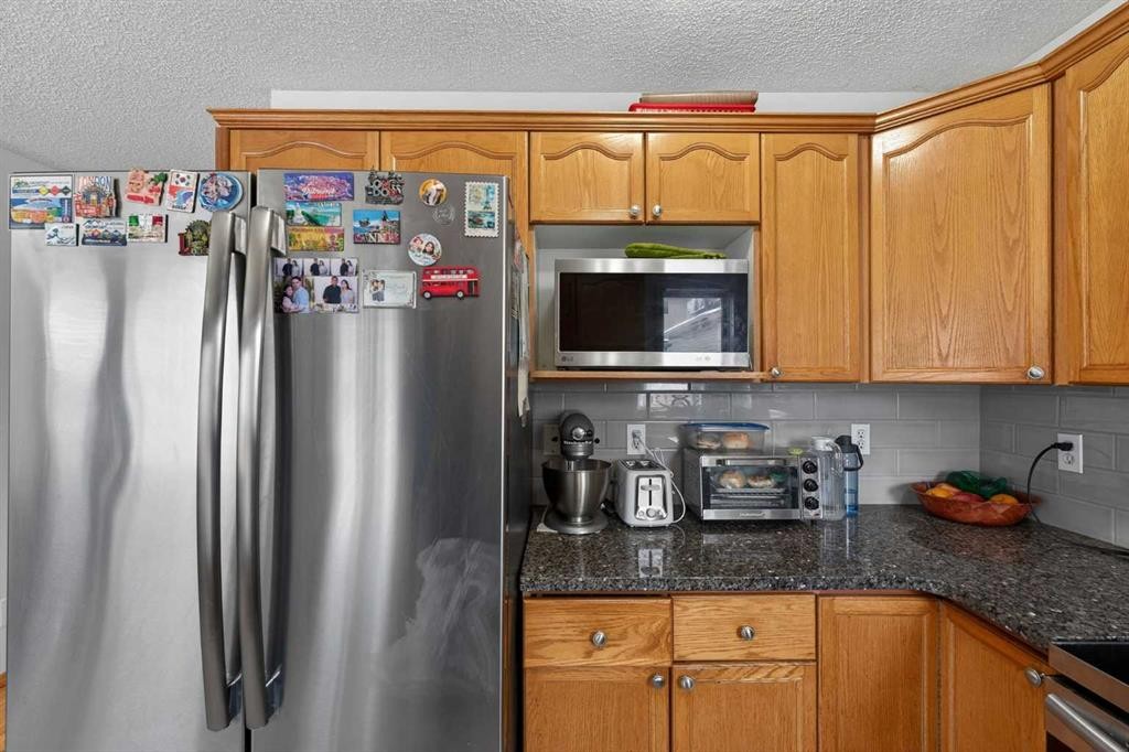 14 Hidden Ranch Hill Nw, Calgary, AB - Indoor Photo Showing Kitchen With Stainless Steel Kitchen