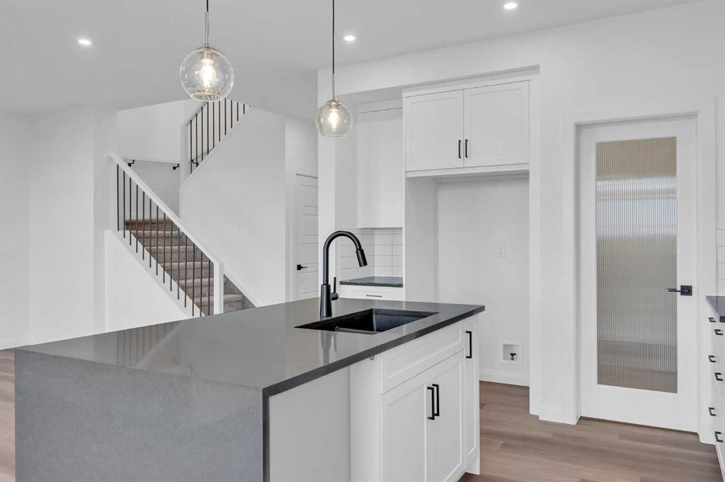 154 Northern Lights Crescent, Langdon, AB - Indoor Photo Showing Kitchen With Upgraded Kitchen