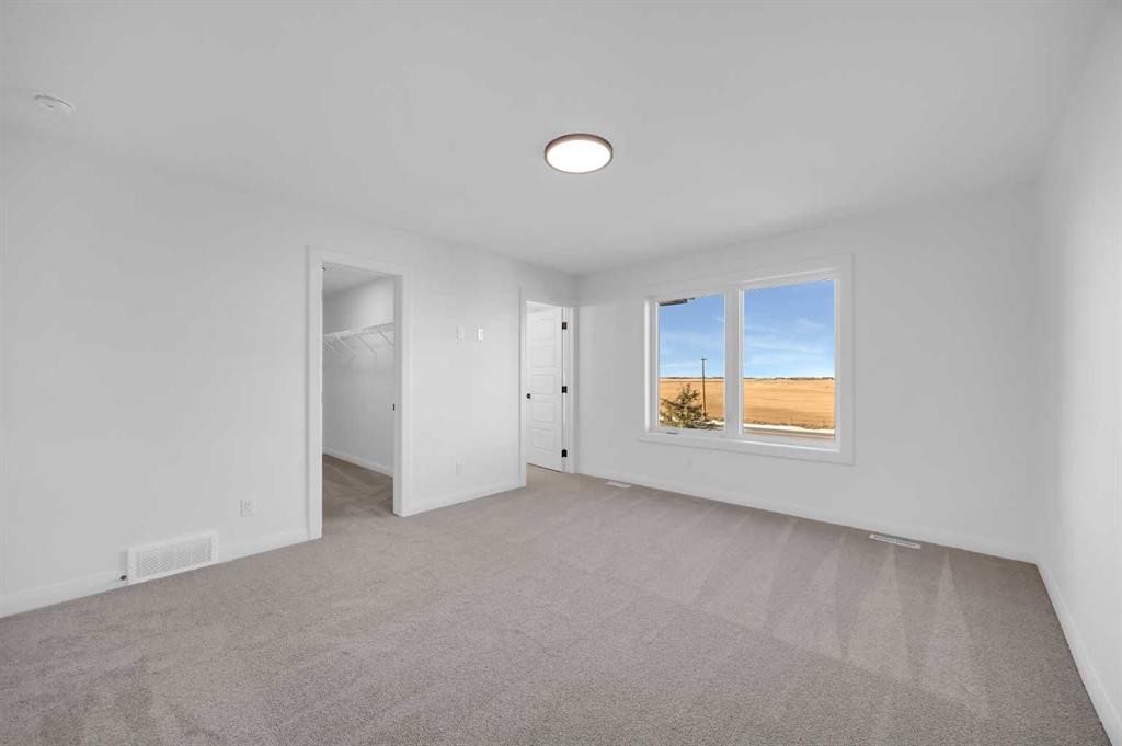 154 Northern Lights Crescent, Langdon, AB - Indoor Photo Showing Other Room