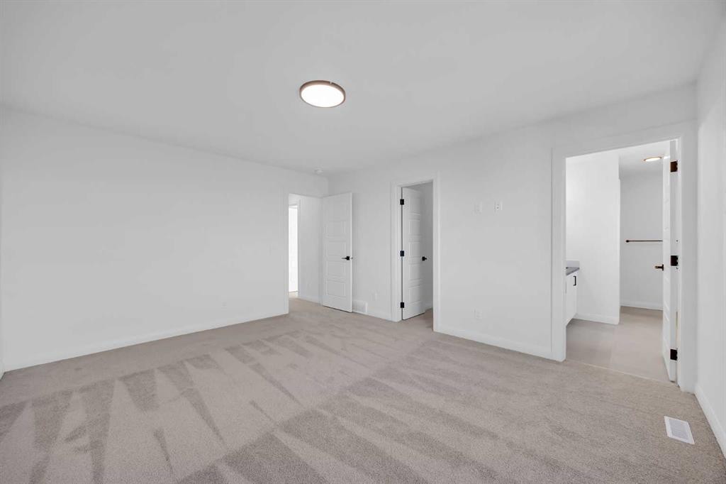 154 Northern Lights Crescent, Langdon, AB - Indoor Photo Showing Other Room