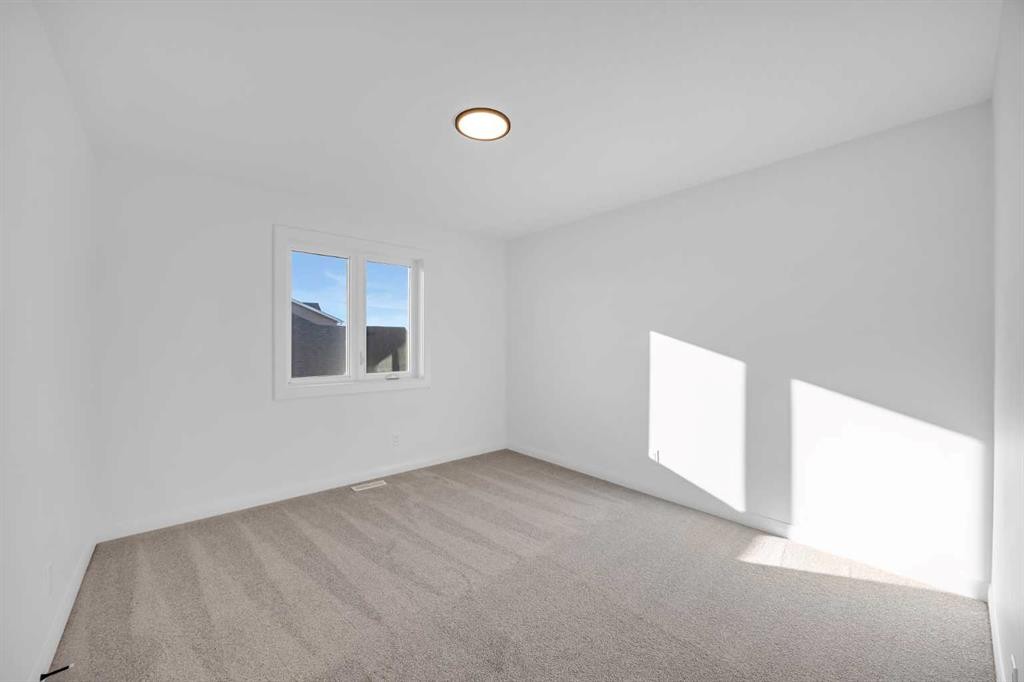 154 Northern Lights Crescent, Langdon, AB - Indoor Photo Showing Other Room