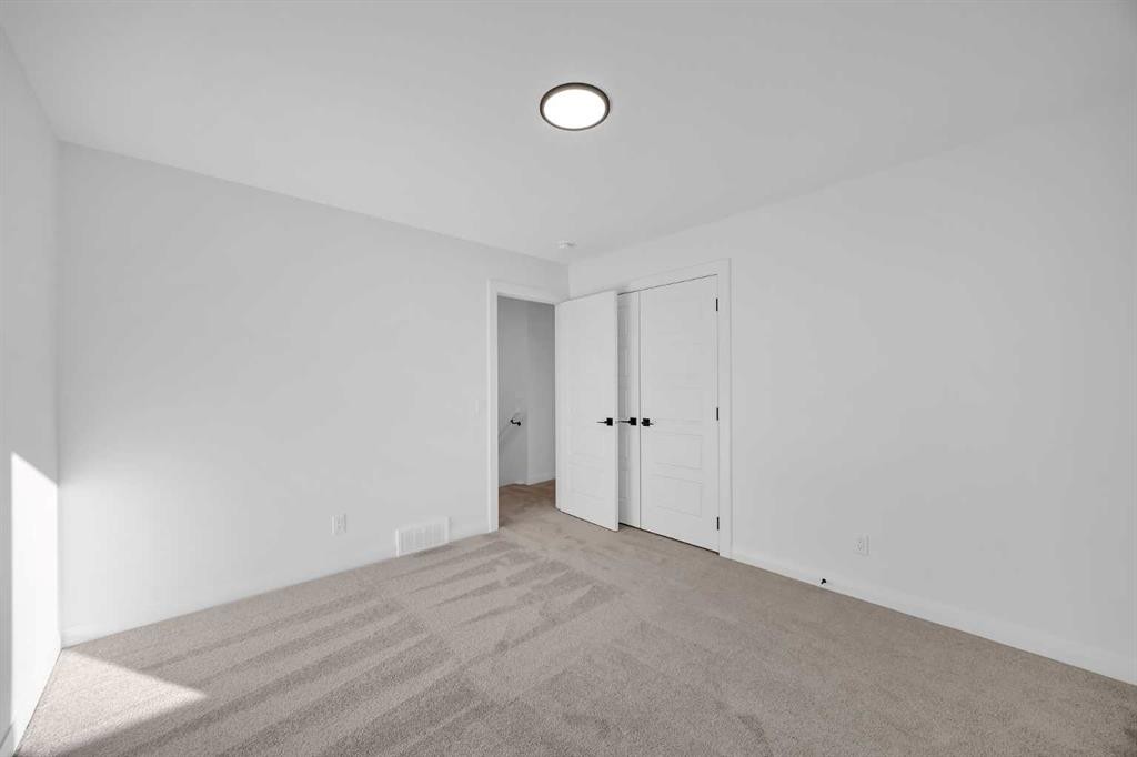 154 Northern Lights Crescent, Langdon, AB - Indoor Photo Showing Other Room