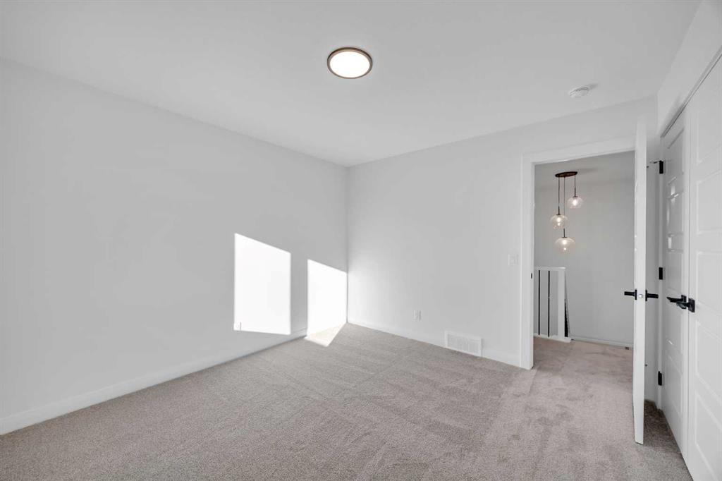 154 Northern Lights Crescent, Langdon, AB - Indoor Photo Showing Other Room