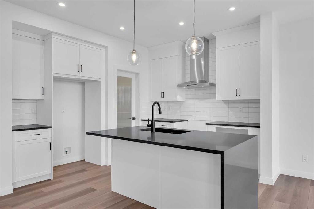 154 Northern Lights Crescent, Langdon, AB - Indoor Photo Showing Kitchen With Upgraded Kitchen