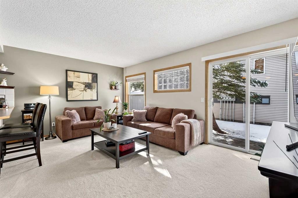 245 Millview Green Sw, Calgary, AB - Indoor Photo Showing Living Room