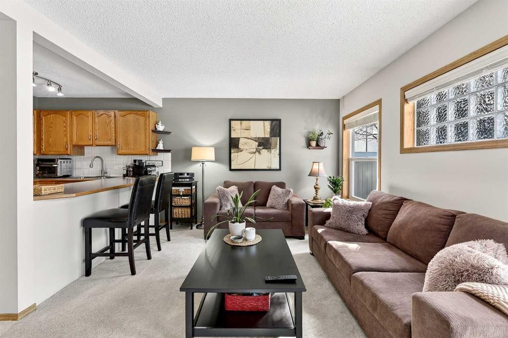 245 Millview Green Sw, Calgary, AB - Indoor Photo Showing Living Room