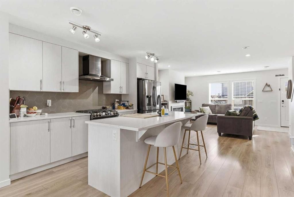 479 Cranbrook Square Se, Calgary, AB - Indoor Photo Showing Kitchen With Upgraded Kitchen