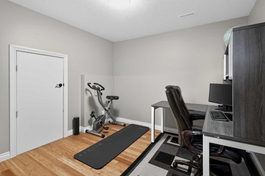 207 Strathmore Lakes Bend, Strathmore, AB - Indoor Photo Showing Gym Room