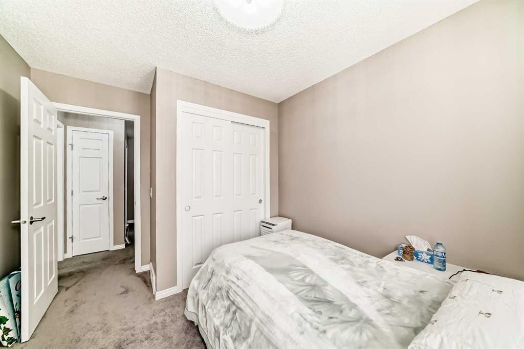 127 Windford Gardens Sw, Airdrie, AB - Indoor Photo Showing Bedroom