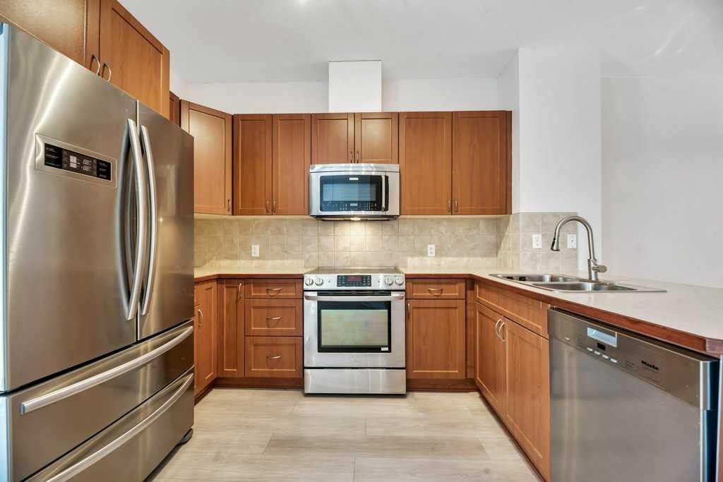 109 Ranch Ridge Meadow, Strathmore, AB - Indoor Photo Showing Kitchen With Double Sink