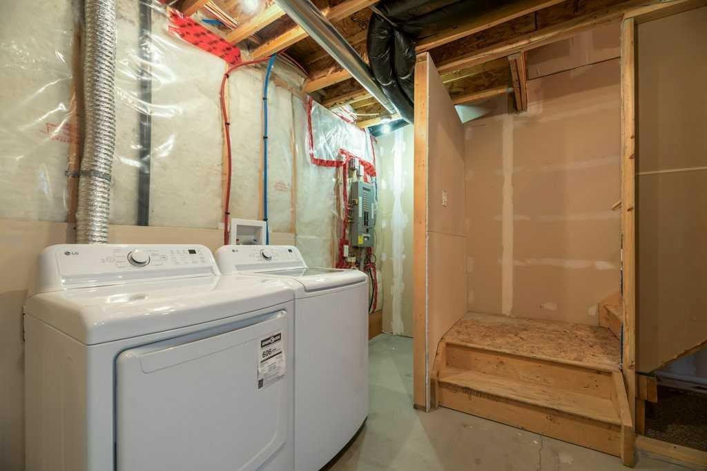 109 Ranch Ridge Meadow, Strathmore, AB - Indoor Photo Showing Laundry Room