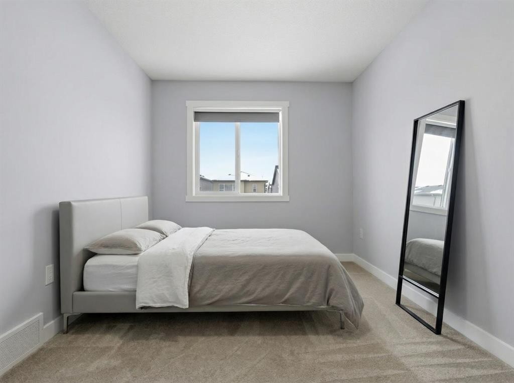 68 Cornerbrook View Ne, Calgary, AB - Indoor Photo Showing Bedroom
