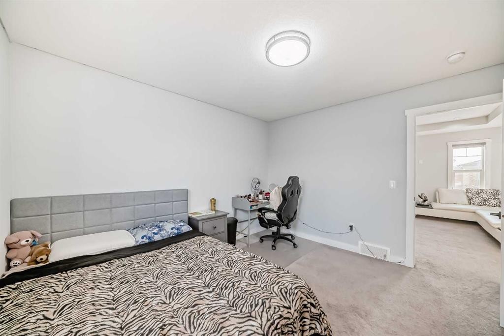 2 Chelsea Bay, Chestermere, AB - Indoor Photo Showing Bedroom