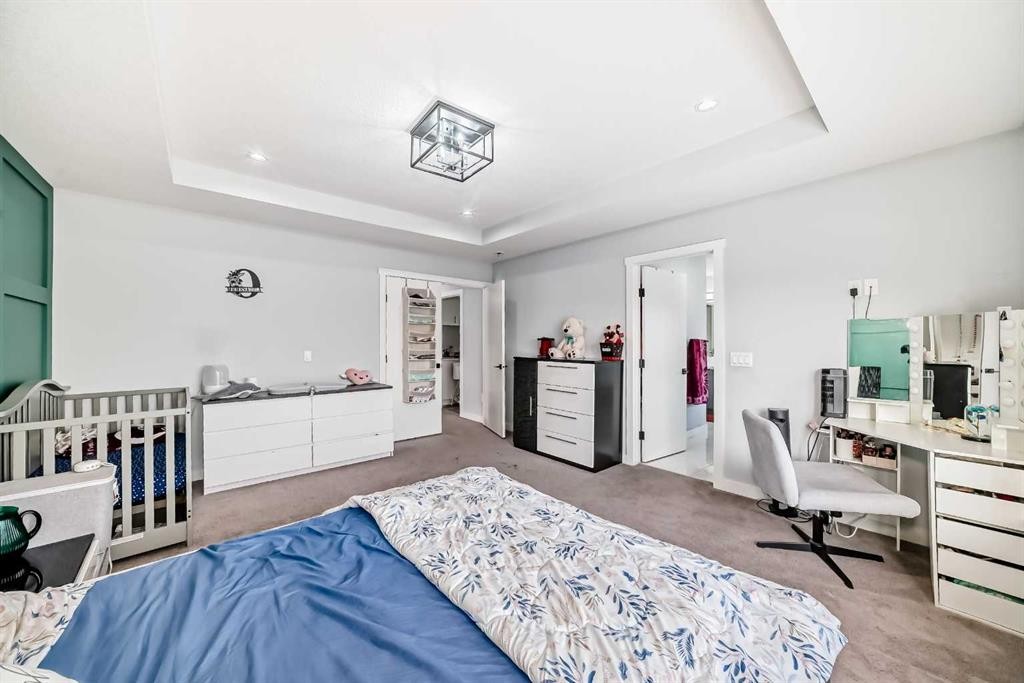 2 Chelsea Bay, Chestermere, AB - Indoor Photo Showing Bedroom